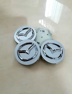 MAZDA LOGO CENTRE CAPS WHEEL HUB 4 X SET ALLOY BADGE EMBLEM SILVER 56mm MPS GTI • £8.50