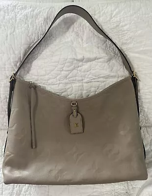 Louis Vuitton Turtledove Monogram Empreinte CarryAll MM Leather Beige • $2575