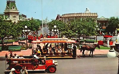 Vintage Postcard Townsquare Disneyland Horse-Drawn Streetcar Ride Flagpole Bands • $8.08