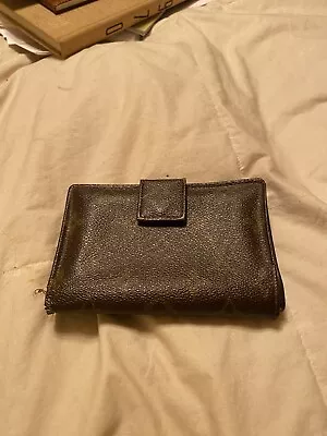 Louis Vuitton Women’s Vintage Wallet • $75