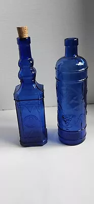 Vintage Cobalt Blue Glass Bottles Lot Of 2 Square And Round Tall Ornate Decor • $29.95