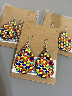 Autism Puzzle Pieces Teardrop Earrings • $5.50