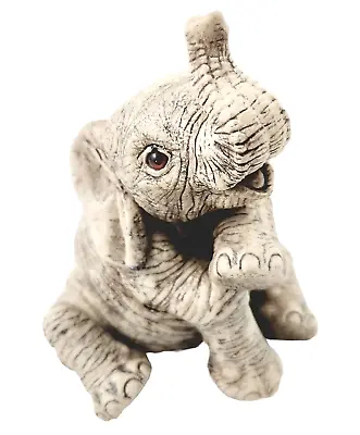 The HERD Peanut Elephant Figurine 1989 Brown Eyes Trunk Up Marty Sculpture 3109  • $29.99