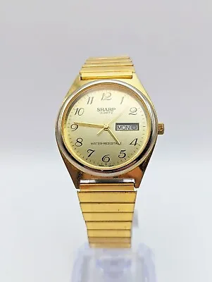 Vintage Sharp Men's Quartz Watch WR GT Spanish Keeps Time/Date/Day New Battery • $22.72