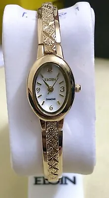 Vintage Elgin Women’s Gold Tone Bangle Style Watch  • $59.99