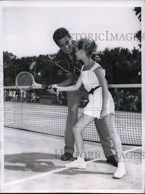 1956 Press Photo Amateur Champ Pancho Gonzales Shows Sally Campbell Pointers • $19.99