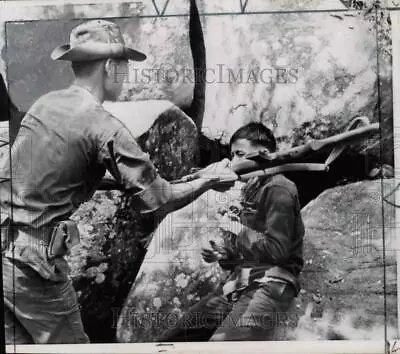 1967 Press Photo Vietnamese Interpreter Hits Viet Cong Prisoner With His Rifle • $19.99