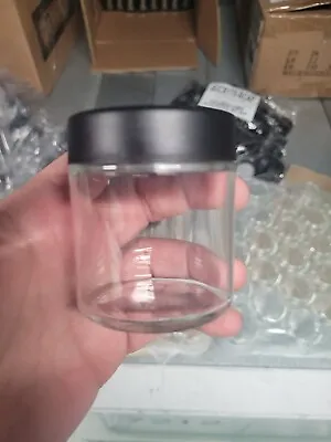 Lot Of 50 3oz Clear Glass Jars With Black Lids  • $49
