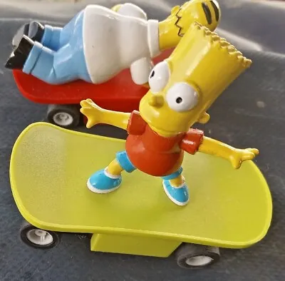 £10 • Buy 2x Micro Scalextric Cars  Simpson Skateboard