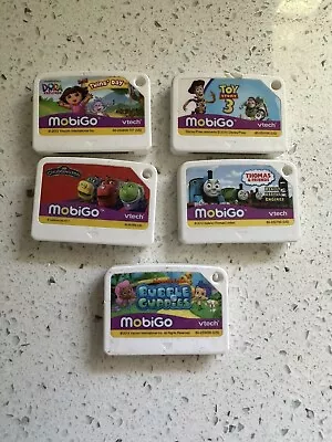 Lot 5 VTech MobiGo Games: Dora Toy StoryChuggington Guppies Thomas The Train • $17