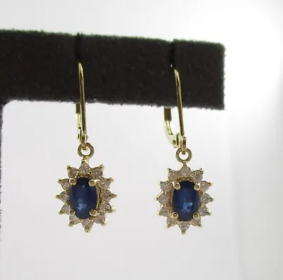 1.0CTW Oval Sapphire 0.50CTW Diamond Dangle Earrings 14 Karat Yellow Gold 1  • $359.99