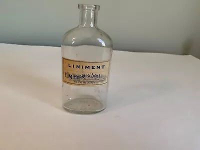 Liniment Medicine Bottle W/ Paper Label From  F.M. Hopkins & Sons Keeseville NY • $4.99