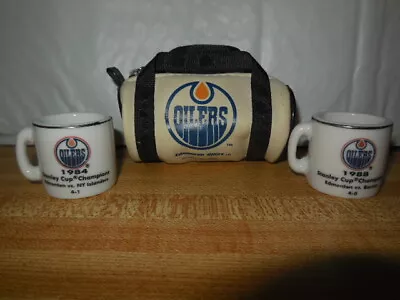 1  Edmonton Oilers Key Chain Bag  2 Mini Stanley Cup Mugs • $35