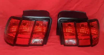 Raxiom 49080 - FITS: 99-04 Ford Mustang Excluding 99-01 Cobra Tail Lights- Black • $90