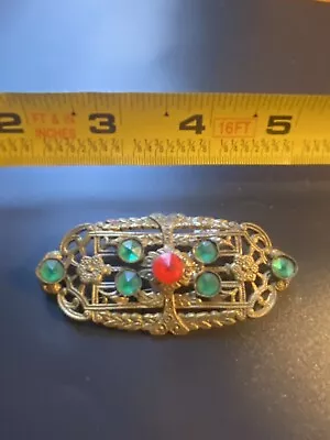 Medieval Gold Tone Texture Brooch Pin With Red And Green Rhinestones 23/4 X 1.5  • $13.95
