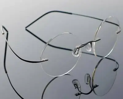 Vintage Eyeglasses Frames Steve Rimless Rx-able Titanium Jobs Mens Glasses Round • £9.71