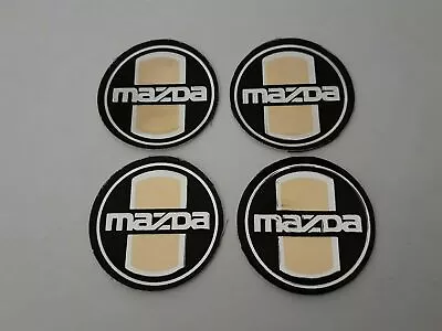 Set Of 4 NOS Vintage MAZDA Embossed Center Cap Decals / Stickers - 37mm • $12