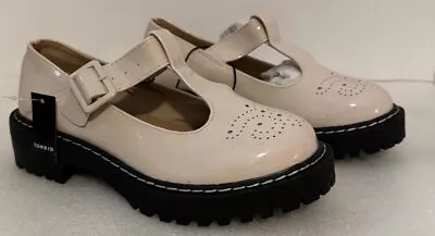 TORRID T-Strap Lug Mary Jane Beige Patent Faux Leather Buckle Shoes Sz 6 NWT • $12