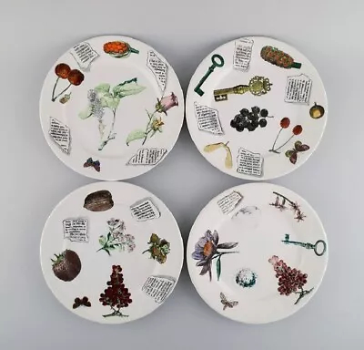 Fornasetti Milano. Four Plates In Hand-painted Porcelain. 1980s. • $840