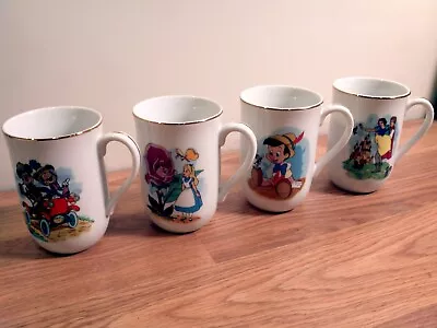 Vintage Walt Disney World Disneyland Coffee Mug Tea Cup Gold Trim Set Of 4 • $24.99