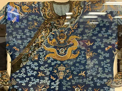 A Rare Qing Dynasty Embroidered Silk Dragon Robe Framed. Early 19th C.  • $45500