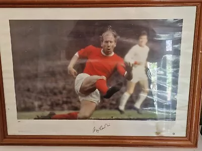 Sir Bobby Charlton Signed Photograph. Manchester United Colours. Frame Included • £15