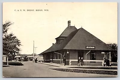 Ripon Wisconsin~C&NW Railroad Depot~Passengers Wait At Station~1910 Sepia PC • $10