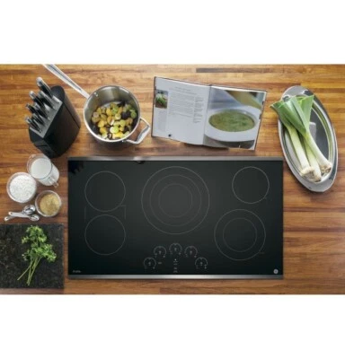 $950 • Buy GE Profile 36  New 5 Element Smooth Surface (Radiant) Stainless Steel PP9036SJSS