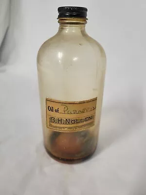 VINTAGE OIL USA JAR EMPTY BOTTLE PAPER LABEL Newton Iowa G.H. Nollen Rx Decor  • $24.99