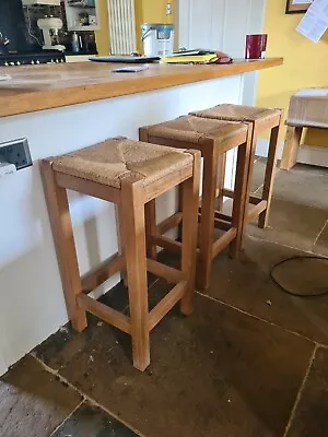 £95 • Buy 3 Oak Bar Stools With Wicker Top. Good Condition. Collection Bingley.