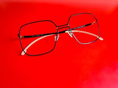 Mykita Black & Gold Velma Eyeglasses  • $400