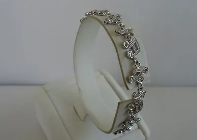 925 Sterling Silver Ladies Musical Note Tennis Bracelet .50 Ct Simulant Diamond  • $88.82