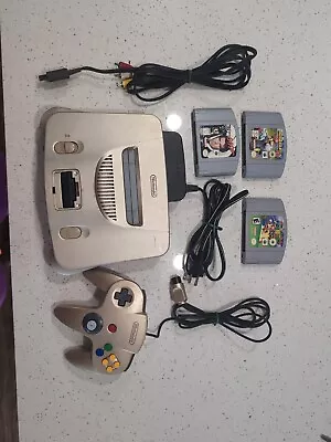 VTG Gold Nintendo N64 Lot Console 007 Goldeneye Mario 64 Mario Kart Controller  • $82