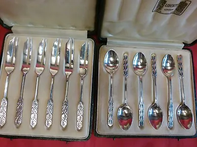 LOVELY CASED SETS1933 LIBERTY & Co SOLID SILVER & ENAMEL SPOONS & CAKE FORKS. • £598