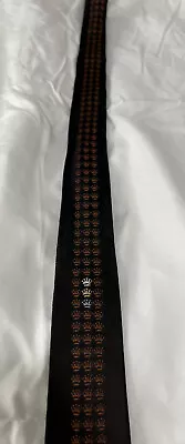 Man’s Tie. Slim Cut.  Brown With Burnt Orange Crown Emblems. • $8.34