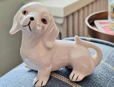 DARLING Vintage White Porcelain DAUCHSHUND Doxy Figurine 4  H X 3.25  W X 2  D • $13