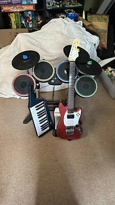 $180 • Buy Xbox 360 Rock Band Instrument Bundle