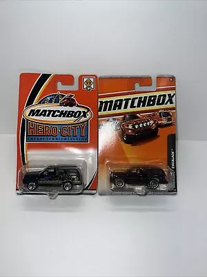 MATCHBOX CADILLAC ESCALADE METALFLAKE DARK RED  Hero City Sawblades Lot Of 2 • $22.99