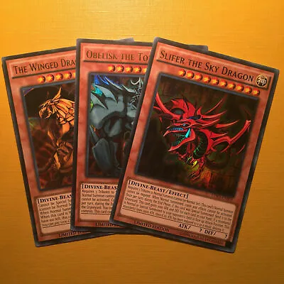 Slifer The Sky Dragon Obelisk Tormentor Winged Ra - YuGiOh Egyptian God Cards! • £7.45