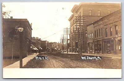 Mt Jewett PA Telephone Poles~Dirt Main St~John ? Furniture~Little Cart~RPPC 1906 • $26