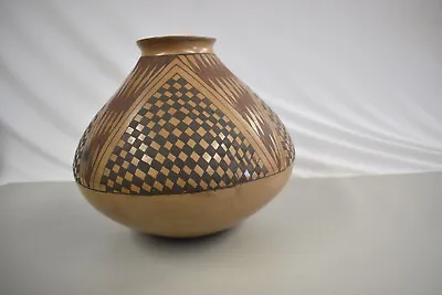 Mata Ortiz  Pottery.   9 H X 10”W • $24