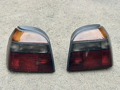 $99 • Buy VW Golf GTI MK3 OEM Smoked Tail Lights By HELLA 1EM 945 096 A And 1EM 945 095 A