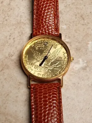 Vintage Oleg Cassini Gold Tone Faux Ten Dollar Coin Watch Brown Leather Band • $19.95