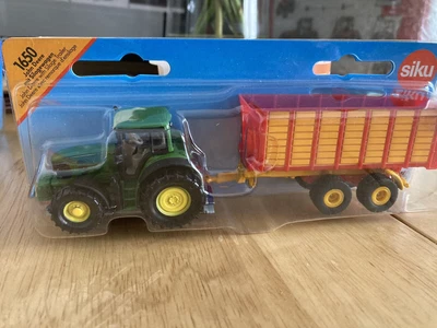 £8 • Buy John Deere With Silage Trailer.