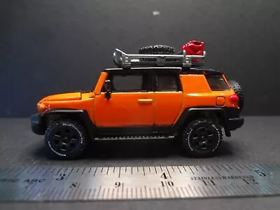 Johnny Lightning 2007 Toyota FJ Cruiser With Roof Rack Orange/black - Loose 1:64 • $8.99