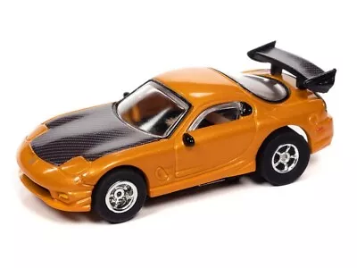 Auto World 1995 Mazda RX-7 (Orange) X-Traction R34 HO Slot Car • $24.99