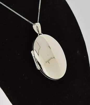 9ct White Gold 30mm Oval Locket  • £340