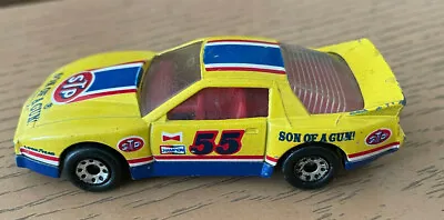Matchbox Pontiac Firebird Racer Diecast Car STP Son Of A Gun 1985 1:64 Yellow 55 • $6.72