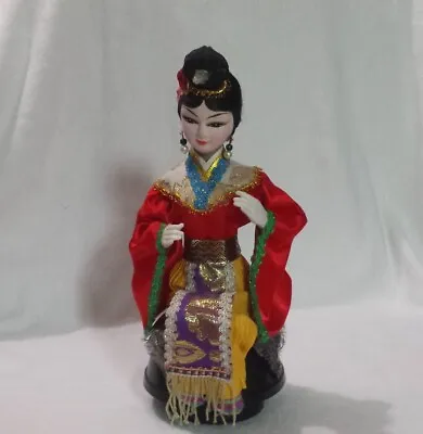 Vintage Indonesian Doll In Costume Music Box Rotating Far East Asian Music 10+  • $15.99