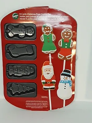 $14.99 • Buy Wilton 8 Cavity Christmas Pops Cookie Pan Santa Stocking Tree Gingerbread Man